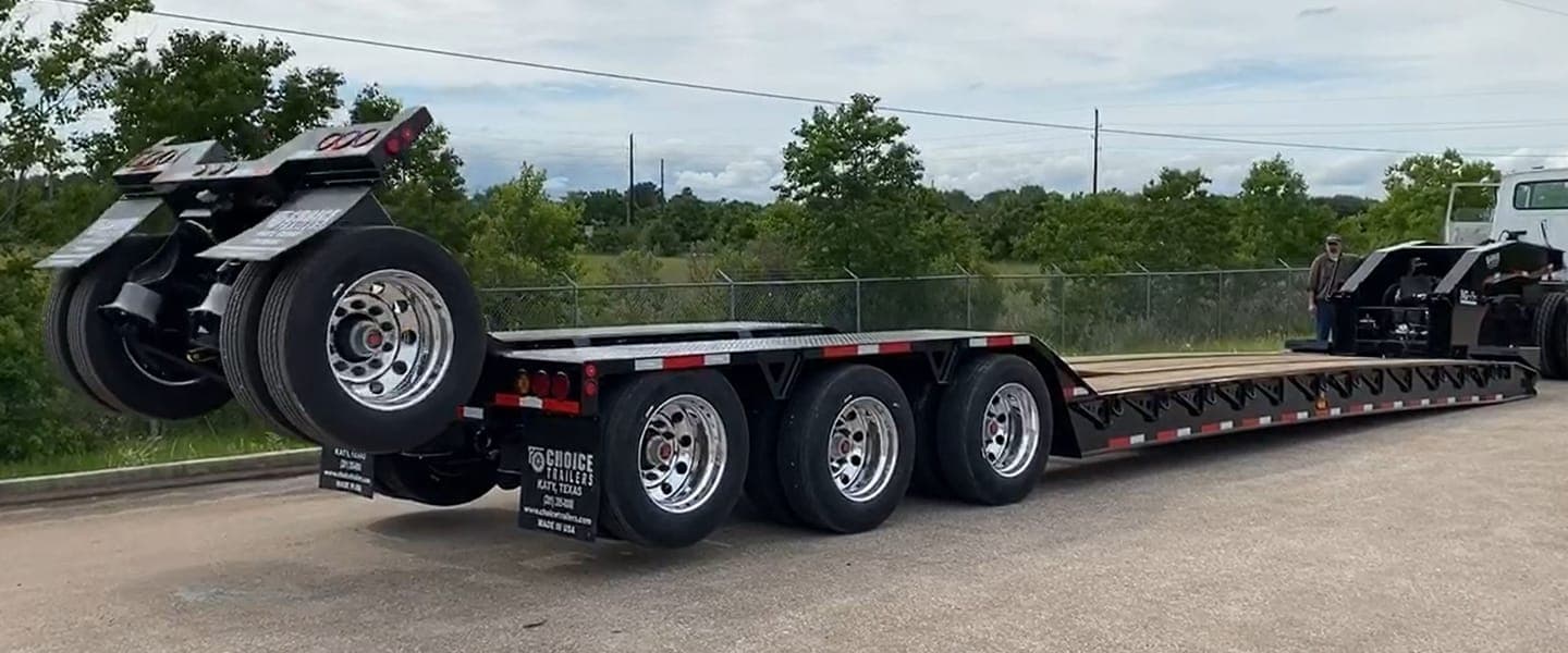 Choice booster axle behind a lowboy