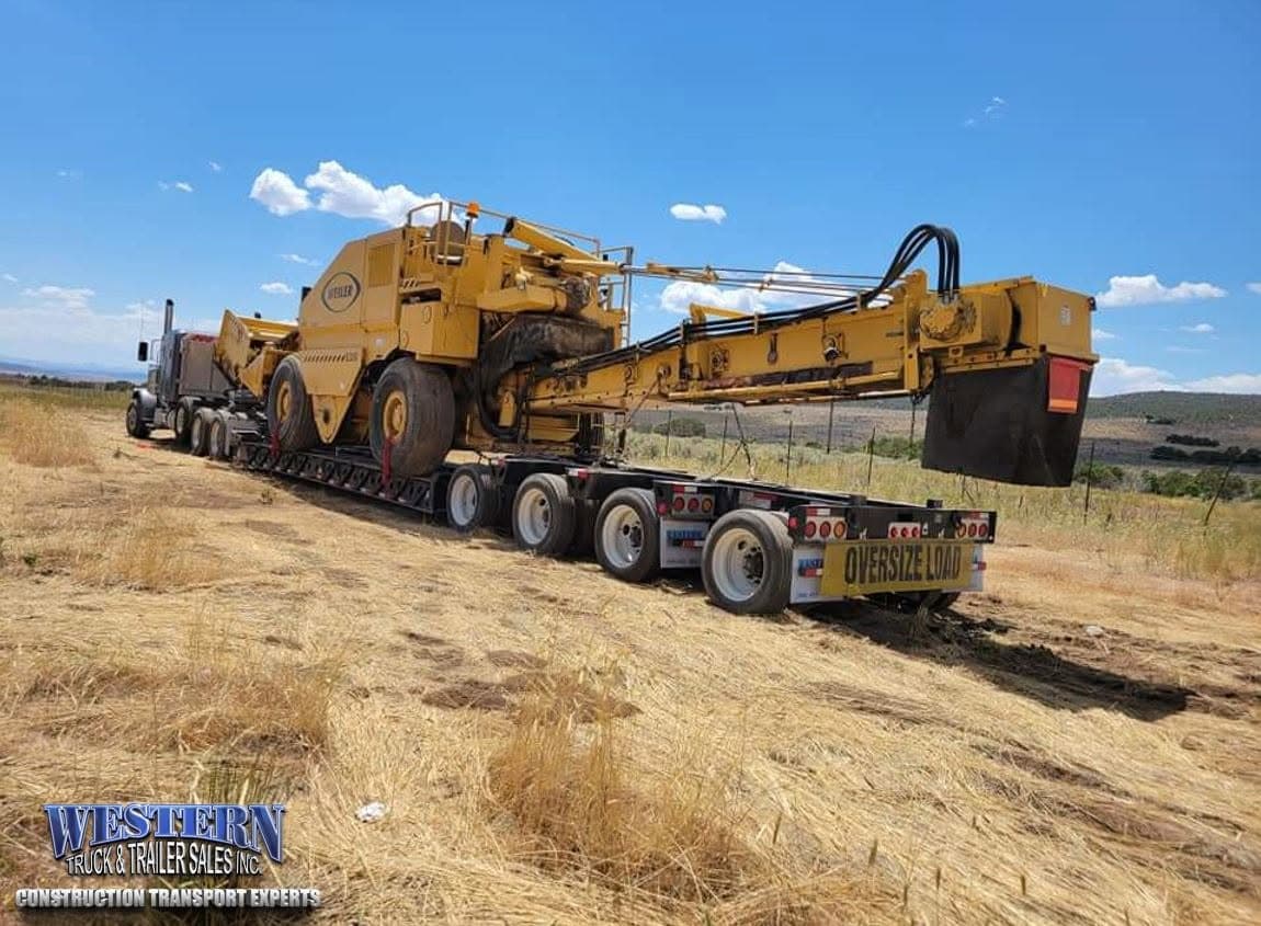 Loaded RGN lowboy trailer at Western Truck & Trailer